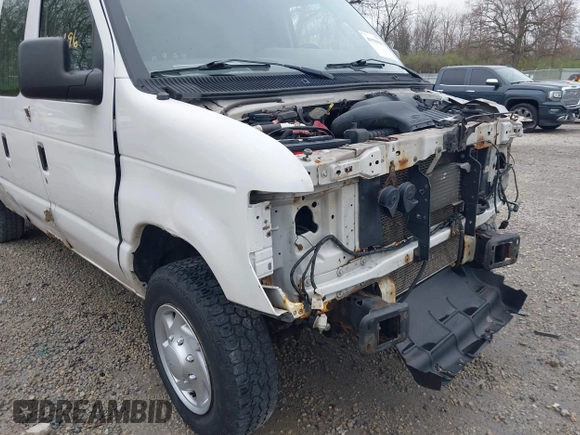 2012 Ford Econoline Cargo Commercial with VIN 1FTNE1EW0CDB10750, listed as a IAAI auction lot 41939696 with 180,042 mi miles. Bid and sale history available at carsss.com. Image 19.
