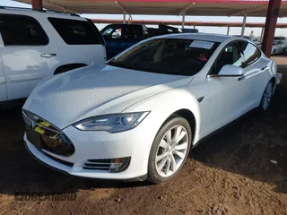 2014 Tesla Model S 60 with VIN 5YJSA1H14EFP63737, listed as a IAAI auction lot 41947610 with 62,240 mi miles and . Bid and sale history available at DreamBid. Image 17.