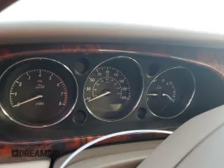 2005 Jaguar XJ with VIN SAJWA79C05SG37189, listed as a Copart auction lot 76804104 with 0 mi miles and Salvage Title. Bid and sale history available at carsss.com. Image 9.