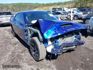 2019 Dodge Challenger SXT with VIN 2C3CDZAG0KH663394, listed as a IAAI auction lot 41738137 with 87,246 mi miles. Bid and sale history available at carsss.com. Image 1.