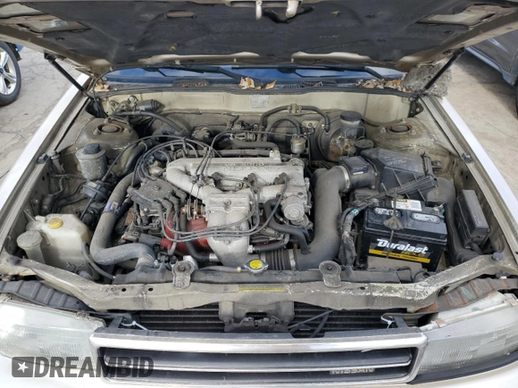 1990 Nissan Maxima with VIN JN1HJ01P8LT402950, listed as a Copart auction lot 82714734 with 60,727 mi miles and Clean title. Bid and sale history available at DreamBid. Image 11.