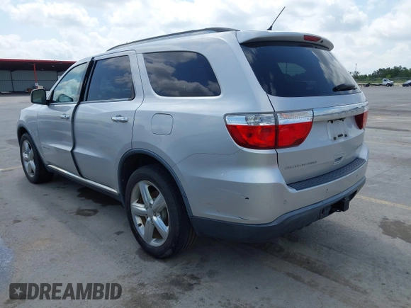 2013 Dodge Durango Citadel with VIN 1C4RDHEG0DC571833, listed as a IAAI auction lot 42736033 with 110,808 mi miles and . Bid and sale history available at DreamBid. Image 3.