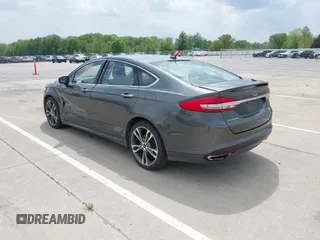 2017 Ford Fusion Titanium with VIN 3FA6P0D93HR261526, listed as a IAAI auction lot 42277350 with 117,388 mi miles and . Bid and sale history available at DreamBid. Image 3.