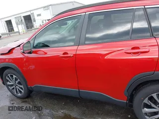 2022 Toyota Corolla Cross XLE z VIN 7MUEAABG0NV030757, wystawiony jako IAAI lot #42597979 z przebiegiem 20 172 mil mil oraz . Historia ofert i sprzedaży dostępna na DreamBid. Obrazek 14.
