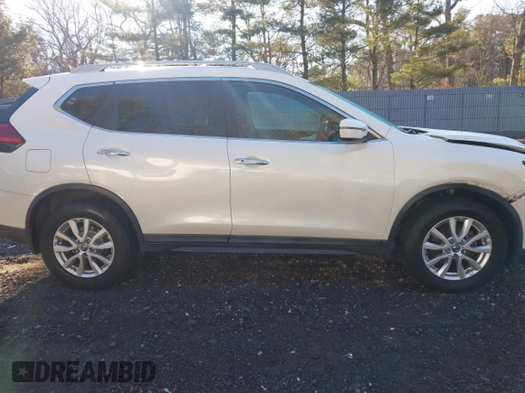 2017 Nissan Rogue SV with VIN 5N1AT2MV2HC843023, listed as a IAAI auction lot 41664836 with 69,946 mi miles and . Bid and sale history available at carsss.com. Image 13.