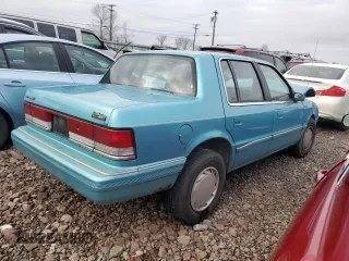 1992 Plymouth Acclaim z VIN 1P3XA4631NF248220, wystawiony jako Copart lot #84113754 z przebiegiem 117 489 mil mil oraz Szkody całkowita. Historia ofert i sprzedaży dostępna na DreamBid. Obrazek 3.