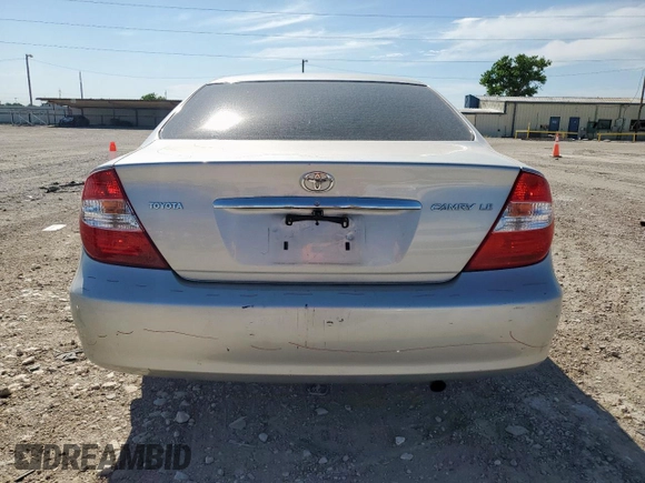 2004 Toyota Camry LE z VIN 4T1BE32K94U313343, wystawiony jako Copart lot #58053425 z przebiegiem 120 515 mil mil oraz Szkoda całkowita • Salvage title. Historia ofert i sprzedaży dostępna na DreamBid. Obrazek 6.