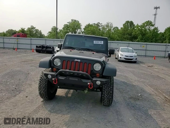 2013 Jeep Wrangler Sport z VIN 1C4AJWAG5DL671491, wystawiony jako Copart lot #59306745 z przebiegiem 111 778 mil mil oraz Szkoda całkowita • Salvage title. Historia ofert i sprzedaży dostępna na DreamBid. Obrazek 13.