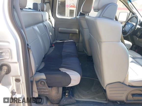 2005 Ford F-150 STX with VIN 1FTRX14W75FB45211, listed as a IAAI auction lot 41998529 with 325,970 mi miles. Bid and sale history available at carsss.com. Image 8.