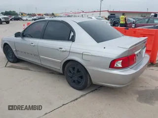 2003 Kia Optima LX z VIN KNAGD128235248556, wystawiony jako IAAI lot #42366002 z przebiegiem 140 904 mil mil oraz . Historia ofert i sprzedaży dostępna na DreamBid. Obrazek 3.