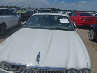 2003 Jaguar XJ 8 with VIN SAJDA14C03LF52338, listed as a IAAI auction lot 42684038 with 142,107 mi miles and . Bid and sale history available at DreamBid. Image 6.