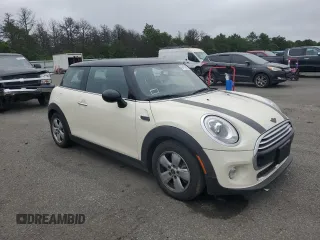2014 MINI Hardtop with VIN WMWXM5C53ET936172, listed as a Copart auction lot 64183805 with 44,783 mi miles and Salvage title. Bid and sale history available at DreamBid. Image 4.