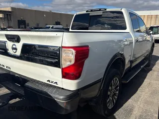 2016 Nissan Titan XD PRO-4X with VIN 1N6BA1F40GN515810, listed as a Copart auction lot 87436204 with 210,650 mi miles and Clean Title. Bid and sale history available at carsss.com. Image 4.