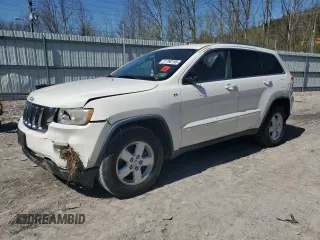 2011 Jeep Grand Cherokee Laredo with VIN 1J4RR4GG8BC724196, listed as a Copart auction lot 51760195 with 79,407 mi miles and Salvage Title. Bid and sale history available at DreamBid. Image 1.