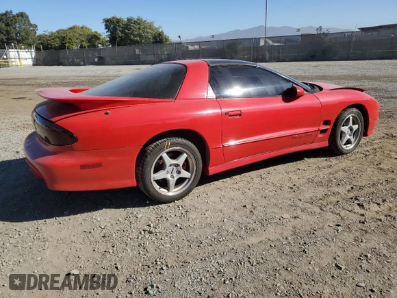 2001 Pontiac Firebird Formula z VIN 2G2FV22G112117625, wystawiony jako Copart lot #81836394 z przebiegiem 142 503 mil mil oraz Szkoda całkowita • Salvage title. Historia ofert i sprzedaży dostępna na DreamBid. Obrazek 3.
