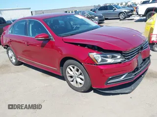 2017 Volkswagen Passat S z VIN 1VWAT7A3XHC027226, wystawiony jako IAAI lot #41857379 z przebiegiem 97 997 mil mil oraz . Historia ofert i sprzedaży dostępna na DreamBid. Obrazek 1.