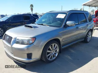 2007 Subaru Forester Sports XT with VIN JF1SG69687H733459, listed as a IAAI auction lot 41827464 with 139,943 mi miles. Bid and sale history available at carsss.com. Image 2.