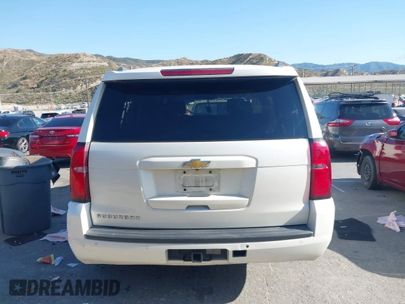 2015 Chevrolet Suburban LT with VIN 1GNSCJKC9FR295169, listed as a IAAI auction lot 42374760 with Not provided miles and . Bid and sale history available at DreamBid. Image 15.