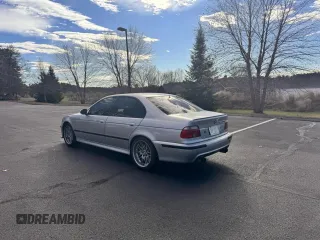 2000 BMW M5 z VIN WBSDE9343YBZ94710, wystawiony jako Copart lot #56716935 z przebiegiem 169 877 mil mil oraz Tytuł czysty. Historia ofert i sprzedaży dostępna na DreamBid. Obrazek 3.