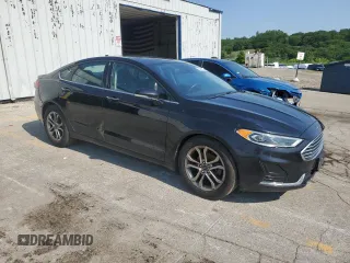 2020 Ford Fusion SEL with VIN 3FA6P0CD7LR203286, listed as a Copart auction lot 63454335 with 147,252 mi miles and Clean title. Bid and sale history available at DreamBid. Image 4.