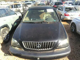 1999 Lexus RX 300 Luxury SUV with VIN JT6HF10U7X0038014, listed as a IAAI auction lot 41244208 with 183,823 mi miles. Bid and sale history available at carsss.com. Image 14.