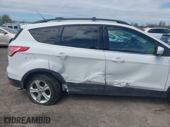 2013 Ford Escape SE with VIN 1FMCU9GX7DUA96986, listed as a IAAI auction lot 42160197 with 193,189 mi miles and . Bid and sale history available at DreamBid. Image 6.