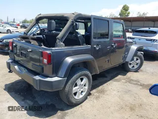 2016 Jeep Wrangler Unlimited Sahara with VIN 1C4HJWEG2GL273507, listed as a IAAI auction lot 39855004 with 87,011 mi miles and . Bid and sale history available at DreamBid. Image 4.