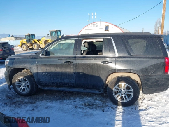 2020 Chevrolet Tahoe LT with VIN 1GNSKBKC9LR309818, listed as a IAAI auction lot 41420268 with 131,823 mi miles and . Bid and sale history available at DreamBid. Image 15.