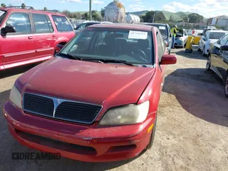 2002 Mitsubishi Lancer LS with VIN JA3AJ36E82U063279, listed as a IAAI auction lot 41711543 with 39,127 mi miles. Bid and sale history available at carsss.com. Image 6.