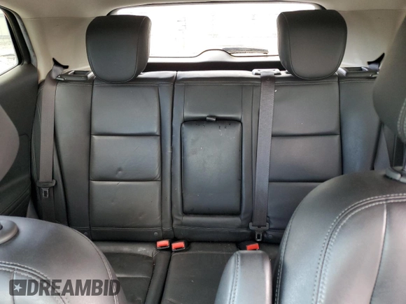 2017 Buick Encore Essence with VIN KL4CJCSB4HB058035, listed as a Copart auction lot 52089365 with 64,194 mi miles and Salvage Title. Bid and sale history available at carsss.com. Image 10.