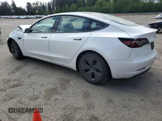 2023 Tesla Model 3 Long Range with VIN 5YJ3E1EB1PF603100, listed as a Copart auction lot 54945865 with 22,865 mi miles and Salvage Title. Bid and sale history available at DreamBid. Image 2.
