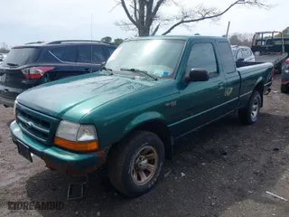 2000 Ford Ranger XL with VIN 1FTYR14V6YTA24267, listed as a IAAI auction lot 41964509 with 140,436 mi miles. Bid and sale history available at carsss.com. Image 2.