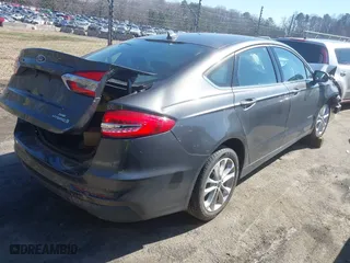 2019 Ford Fusion Hybrid SE with VIN 3FA6P0LU1KR235021, listed as a IAAI auction lot 41660786 with 93,331 mi miles. Bid and sale history available at carsss.com. Image 4.