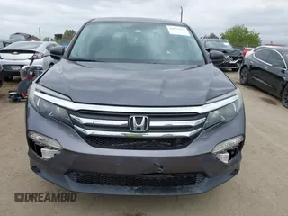 2016 Honda Pilot LX with VIN 5FNYF5H14GB037205, listed as a IAAI auction lot 42034018 with 101,943 mi miles and . Bid and sale history available at DreamBid. Image 12.