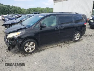 2011 Toyota Sienna LE AAS with VIN 5TDKK3DC9BS082433, listed as a Copart auction lot 57993195 with 131,392 mi miles and Salvage title. Bid and sale history available at DreamBid. Image 1.