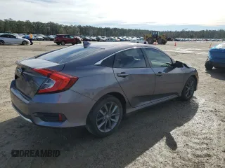 2021 Honda Civic Sedan EX-L with VIN 19XFC1F74ME002424, listed as a Copart auction lot 86898084 with 32,702 mi miles and Salvage Title. Bid and sale history available at carsss.com. Image 3.