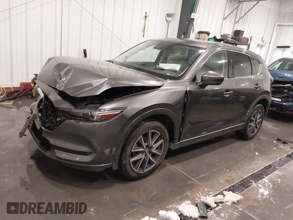 2017 Mazda CX-5 Grand Touring with VIN JM3KFADLXH0151593, listed as a IAAI auction lot 41823378 with 149,299 mi miles. Bid and sale history available at carsss.com. Image 18.