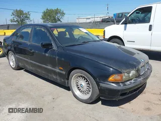 2000 BMW 5 Series 528i with VIN WBADM6349YGU29547, listed as a IAAI auction lot 42138468 with 207,469 mi miles and . Bid and sale history available at DreamBid. Image 1.
