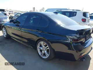 2014 BMW 3 Series 328i with VIN WBA3C1C54EK117252, listed as a IAAI auction lot 42338440 with 126,877 mi miles and . Bid and sale history available at DreamBid. Image 3.