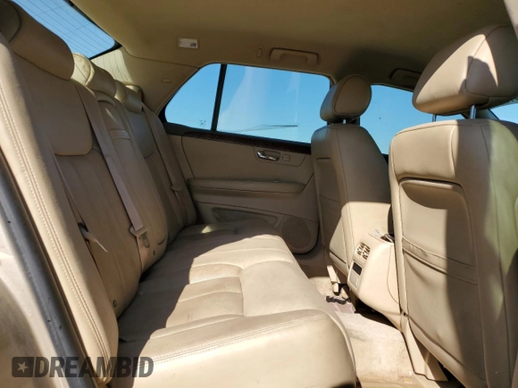 2006 Cadillac DTS 1SB z VIN 1G6KD57Y66U101604, wystawiony jako Copart lot #49918215 z przebiegiem 192 825 mil mil oraz Czysty tytuł • Clean title. Historia ofert i sprzedaży dostępna na DreamBid. Obrazek 10.