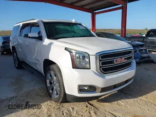 2016 GMC Yukon XL SLT z VIN 1GKS1GKC7GR288339, wystawiony jako IAAI lot #41949409 z przebiegiem 158 152 mil mil oraz . Historia ofert i sprzedaży dostępna na DreamBid. Obrazek 1.