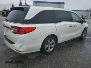 2018 Honda Odyssey EX-L with VIN 5FNRL6H77JB008571, listed as a Copart auction lot 46948585 with 88,699 mi miles and Salvage Title. Bid and sale history available at carsss.com. Image 3.