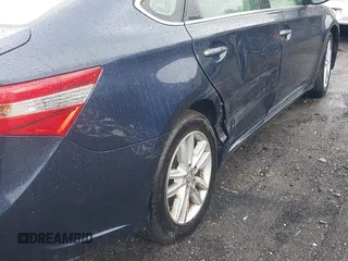 2014 Toyota Avalon Limited z VIN 4T1BK1EB5EU098361, wystawiony jako IAAI lot #42317290 z przebiegiem 243 175 mil mil oraz . Historia ofert i sprzedaży dostępna na DreamBid. Obrazek 6.