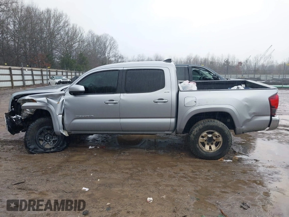 2018 Toyota Tacoma SR with VIN 3TMCZ5AN4JM148581, listed as a IAAI auction lot 41462945 with 115,655 mi miles. Bid and sale history available at carsss.com. Image 14.