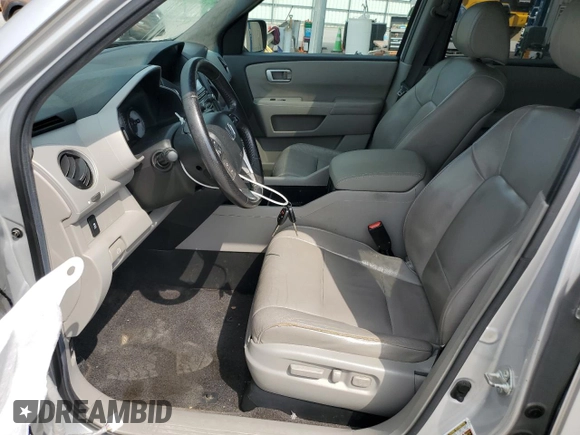 2012 Honda Pilot EX-L z VIN 5FNYF4H65CB023751, wystawiony jako Copart lot #57258845 z przebiegiem 284 177 mil mil oraz Szkoda całkowita • Salvage title. Historia ofert i sprzedaży dostępna na DreamBid. Obrazek 7.