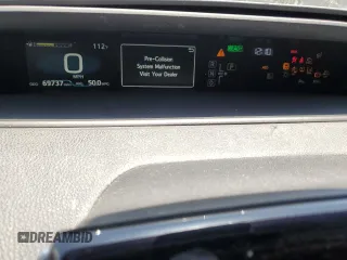 2022 Toyota Prius L Eco z VIN JTDKAMFU1N3157291, wystawiony jako Copart lot #58756485 z przebiegiem 69 737 mil mil oraz Szkoda całkowita • Salvage title. Historia ofert i sprzedaży dostępna na DreamBid. Obrazek 9.