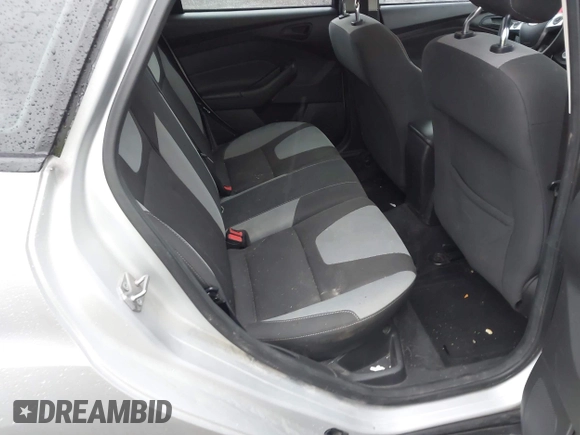 2012 Ford Focus SE z VIN 1FAHP3K27CL152803, wystawiony jako IAAI lot #42058556 z przebiegiem 181 717 mil mil oraz . Historia ofert i sprzedaży dostępna na DreamBid. Obrazek 8.
