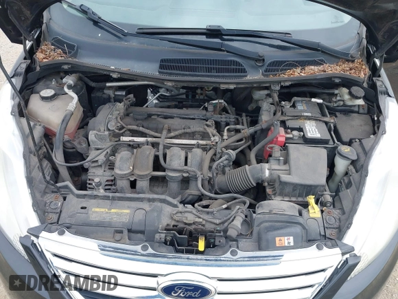 2011 Ford Fiesta SE z VIN 3FADP4BJ3BM147784, wystawiony jako IAAI lot #42567083 z przebiegiem 104 843 mil mil oraz . Historia ofert i sprzedaży dostępna na DreamBid. Obrazek 10.