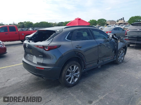 2021 Mazda CX-30 Preferred with VIN 3MVDMACLXMM228431, listed as a IAAI auction lot 41575602 with 67,854 mi miles. Bid and sale history available at carsss.com. Image 4.