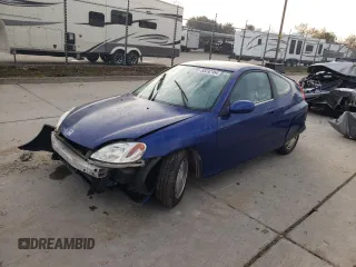 2003 Honda Insight z VIN JHMZE14733T000310, wystawiony jako Copart lot #83232164 z przebiegiem 116 183 mil mil oraz Szkoda całkowita • Salvage title. Historia ofert i sprzedaży dostępna na DreamBid. Obrazek 1.